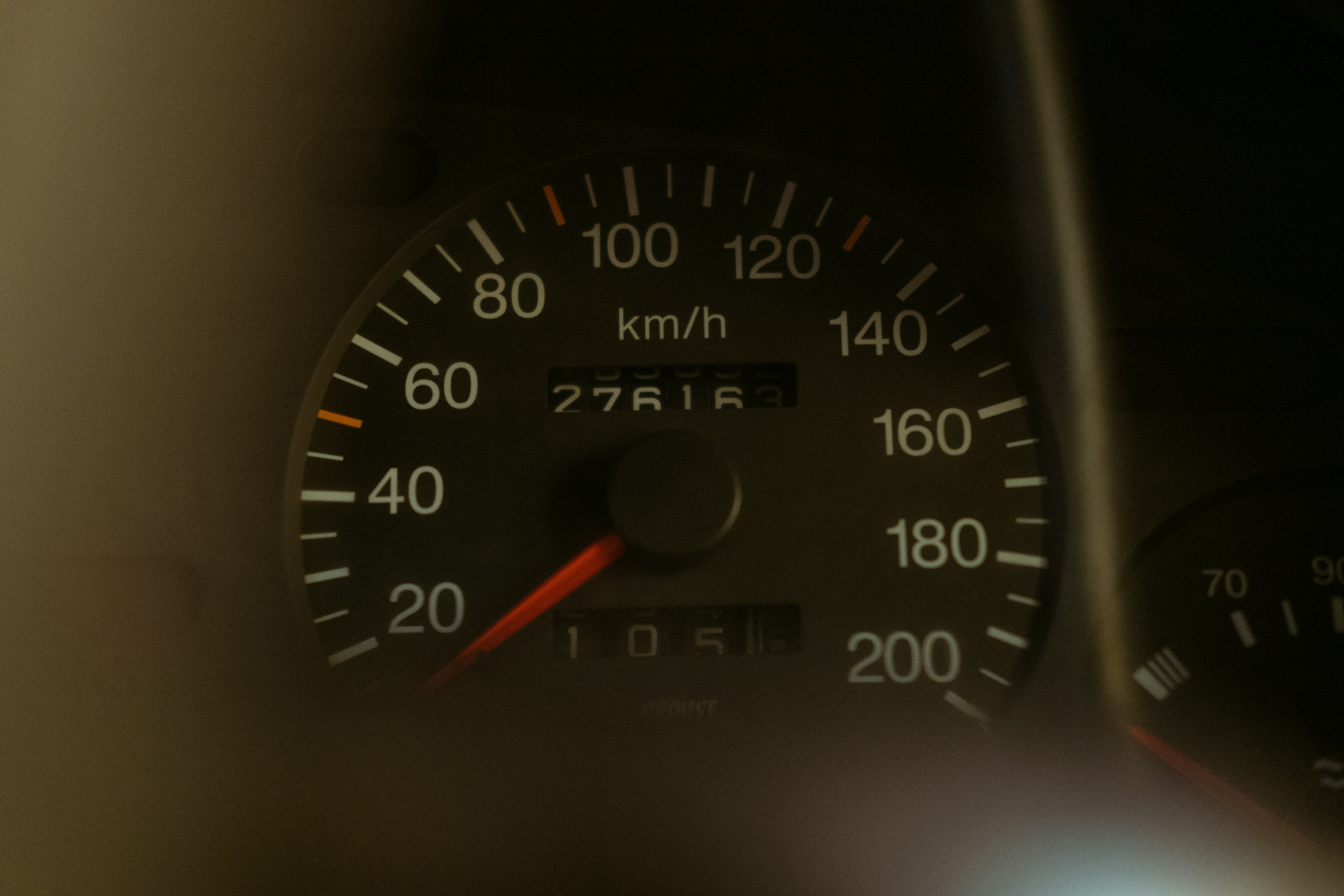 a close up of a speedometer in a vehicle